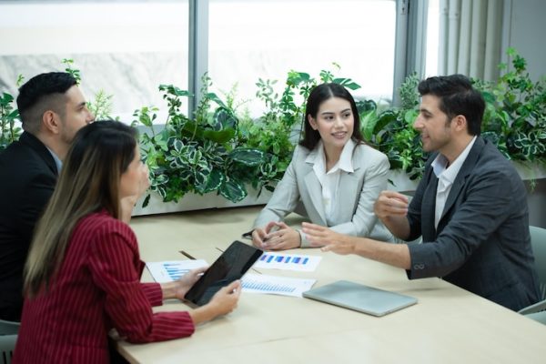 group-young-entrepreneurs-meeting-exchange-opinions-review-information_159755-12888